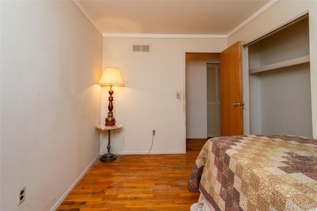 9892 Wheeler St, Van Buren, MI 48111 - bedroom featuring wood finished floors and crown molding