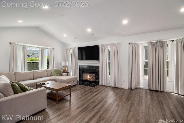3708 Eaton Gate Ln, Auburn Hills, MI 48326 - living area featuring lofted ceiling, wood finished floors, recessed lighting, and a fireplace
