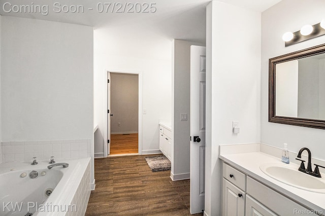 3708 Eaton Gate Ln, Auburn Hills, MI 48326 - full bathroom featuring vanity, a tub with jets, and wood finished floors