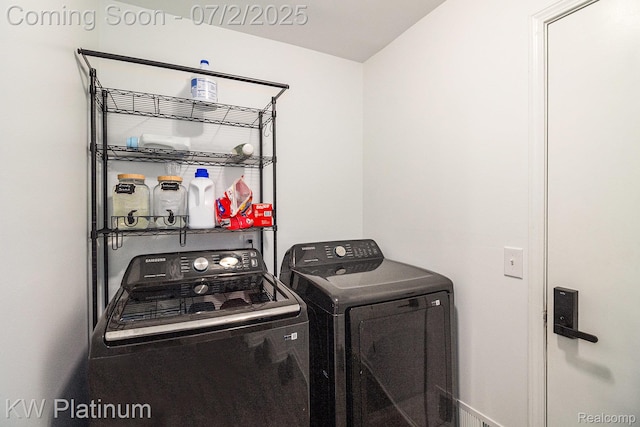 3708 Eaton Gate Ln, Auburn Hills, MI 48326 - laundry area with washing machine and clothes dryer