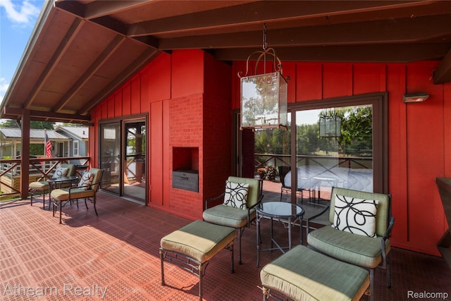 6600 W Shore Dr, Weidman, MI 48893 - sunroom / solarium with vaulted ceiling and plenty of natural light