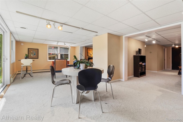 6600 W Shore Dr, Weidman, MI 48893 - dining space featuring rail lighting, carpet flooring, and a drop ceiling