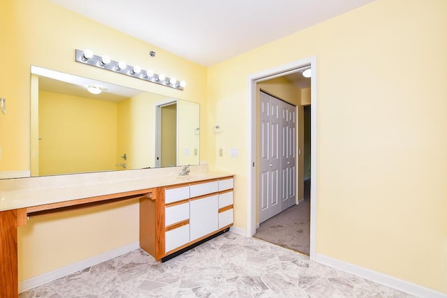 2208 Parkview Ave, Kalamazoo, MI 49008 - bathroom with vanity and baseboards