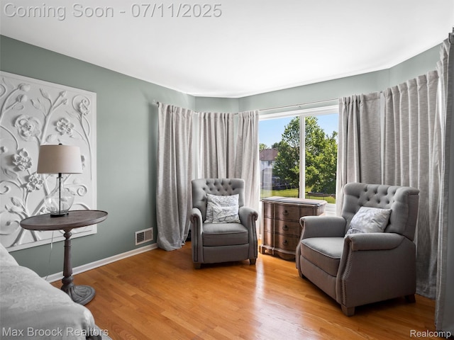39104 Devonshire Ct, Harrison Township, MI 48045 - sitting room with light wood-style floors and baseboards