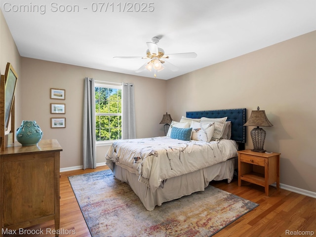 39104 Devonshire Ct, Harrison Township, MI 48045 - bedroom with light wood-type flooring and ceiling fan