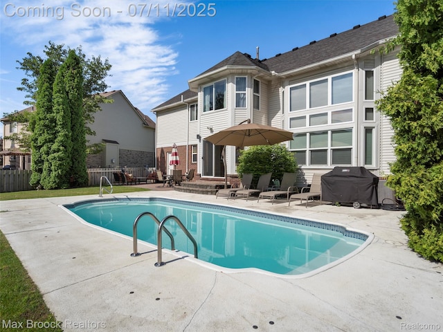 39104 Devonshire Ct, Harrison Township, MI 48045 - view of pool with a patio area and area for grilling