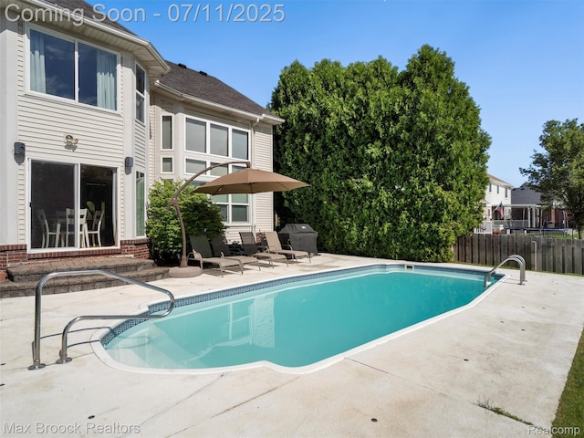 39104 Devonshire Ct, Harrison Township, MI 48045 - view of swimming pool with a patio area, a grill, and entry steps