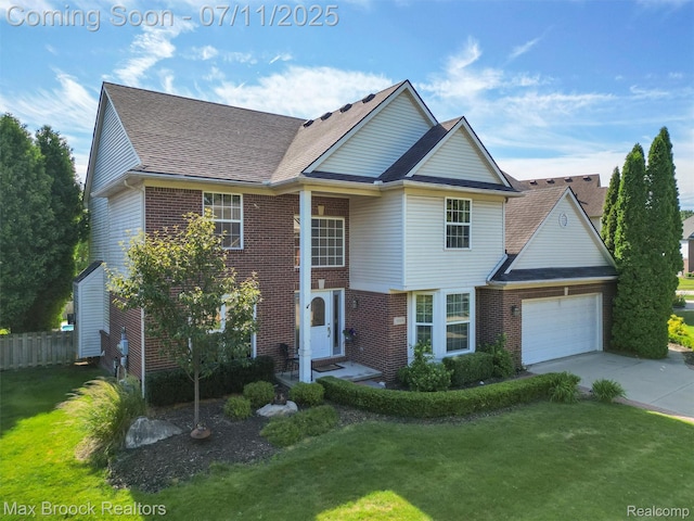 39104 Devonshire Ct, Harrison Township, MI 48045 - traditional home with a garage, brick siding, driveway, and a shingled roof