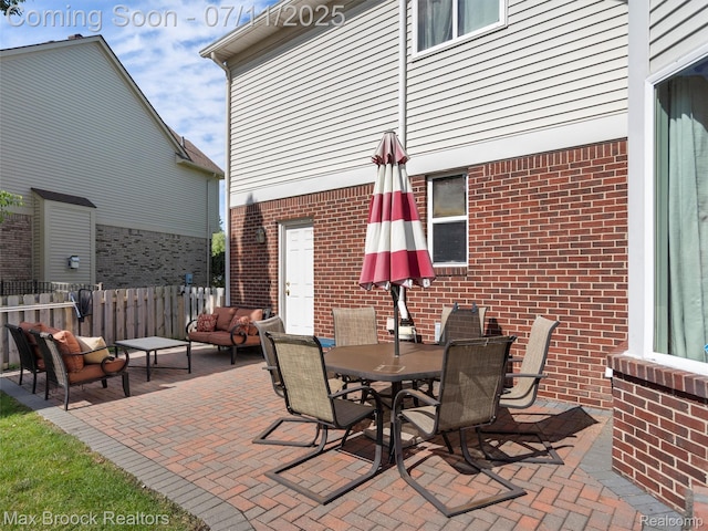 39104 Devonshire Ct, Harrison Township, MI 48045 - view of patio / terrace featuring outdoor dining space and outdoor lounge area