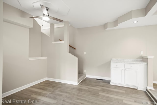 3321 Stone St, Port Huron, MI 48060 - interior space with stairs, a ceiling fan, and light wood-style floors