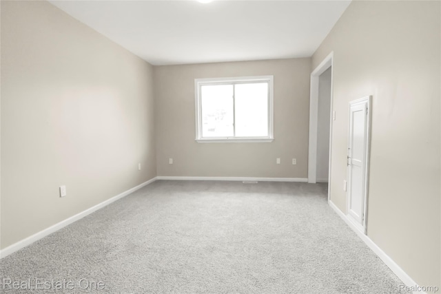 3321 Stone St, Port Huron, MI 48060 - spare room featuring carpet flooring and baseboards