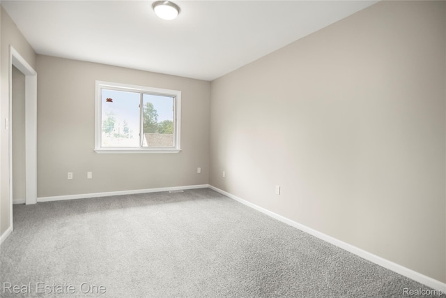 3321 Stone St, Port Huron, MI 48060 - unfurnished room featuring carpet flooring and baseboards
