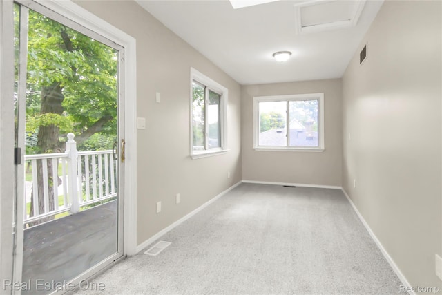 3321 Stone St, Port Huron, MI 48060 - carpeted empty room with baseboards and attic access