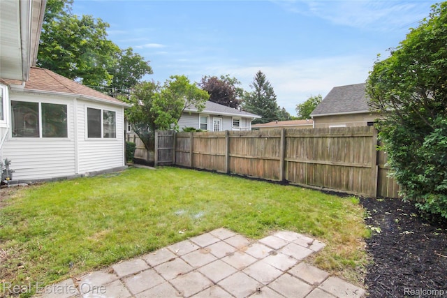 3321 Stone St, Port Huron, MI 48060 - fenced backyard with a patio area