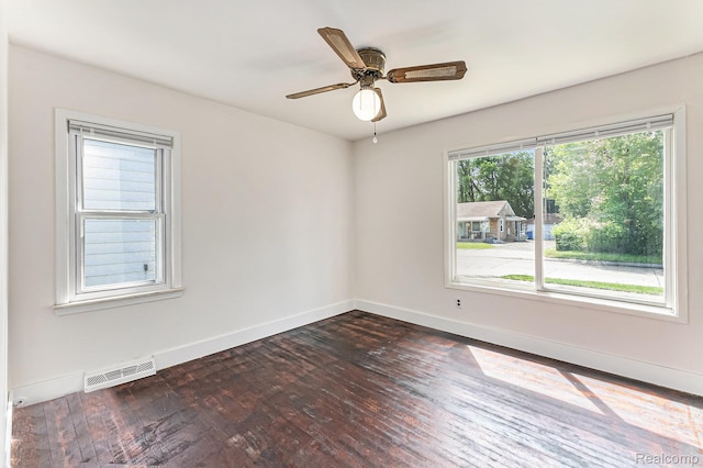 21048 Audrey Ave, Warren, MI 48091 - empty room featuring dark wood-style flooring and ceiling fan