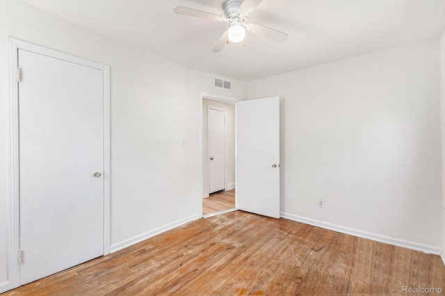 21048 Audrey Ave, Warren, MI 48091 - unfurnished bedroom featuring light wood finished floors and a ceiling fan