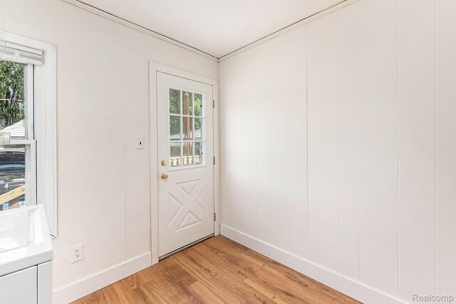 21048 Audrey Ave, Warren, MI 48091 - doorway to outside with light wood finished floors and healthy amount of natural light