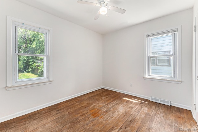 21048 Audrey Ave, Warren, MI 48091 - empty room with hardwood / wood-style floors and a ceiling fan