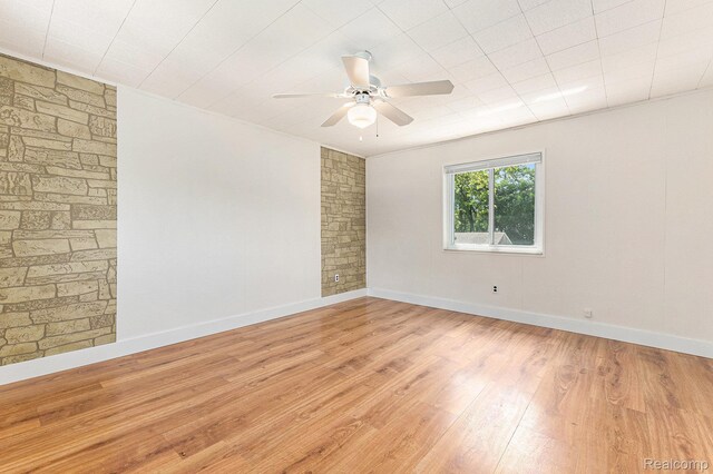 21048 Audrey Ave, Warren, MI 48091 - spare room with light wood-style flooring and a ceiling fan