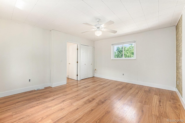 21048 Audrey Ave, Warren, MI 48091 - unfurnished bedroom featuring light wood-style floors and ceiling fan