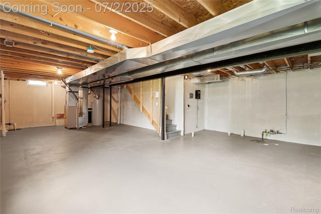 10074 Pond View Trl, Holly, MI 48442 - basement with heating unit, stairs, and water heater