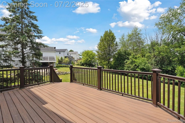 10074 Pond View Trl, Holly, MI 48442 - wooden terrace with a trampoline and a lawn
