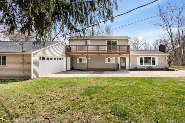 1593 Parke St, Rochester Hills, MI 48307 - back of house with a garage, a chimney, a wooden deck, and a lawn