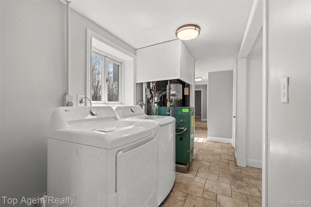 1593 Parke St, Rochester Hills, MI 48307 - laundry room featuring washing machine and dryer and light stone finish floors