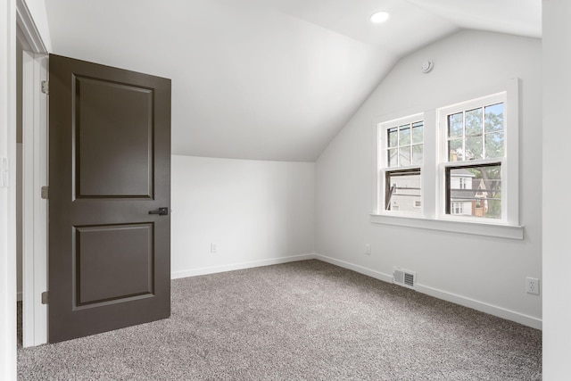 1680 Kalamazoo Ave SE, Grand Rapids, MI 49507 - additional living space featuring vaulted ceiling, carpet flooring, and recessed lighting