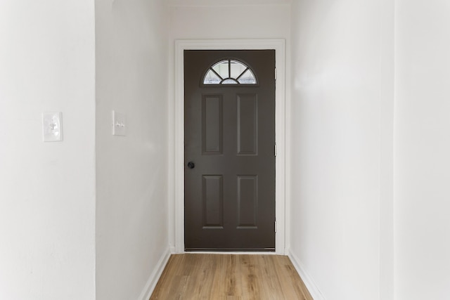 1680 Kalamazoo Ave SE, Grand Rapids, MI 49507 - doorway featuring light wood finished floors and baseboards