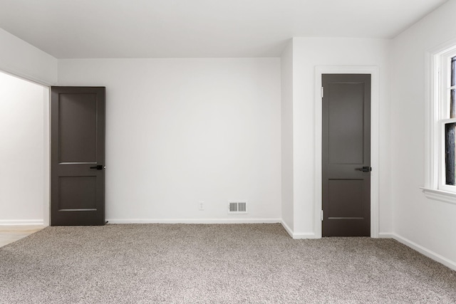 1680 Kalamazoo Ave SE, Grand Rapids, MI 49507 - carpeted spare room with baseboards