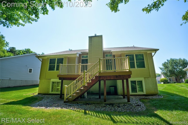 1211 Creek View Ct, Burton, MI 48509 - back of house with stairway, brick siding, a lawn, and a chimney