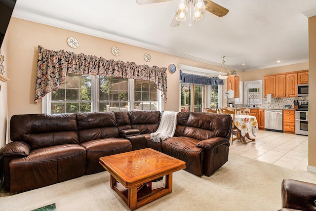 4673 Chasemoor Dr, Portage, MI 49024 - living area with crown molding, a ceiling fan, light carpet, plenty of natural light, and light tile patterned flooring