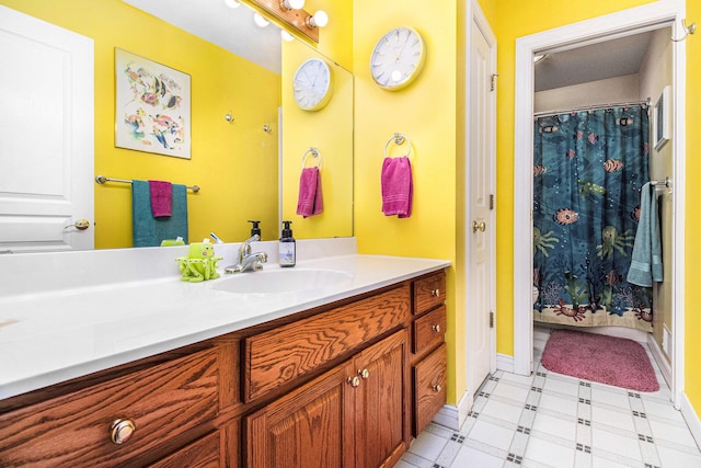 4673 Chasemoor Dr, Portage, MI 49024 - full bathroom featuring vanity, tile patterned floors, and curtained shower