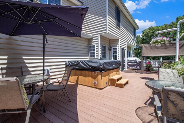 4673 Chasemoor Dr, Portage, MI 49024 - deck with a hot tub, outdoor dining space, grilling area, and a pergola