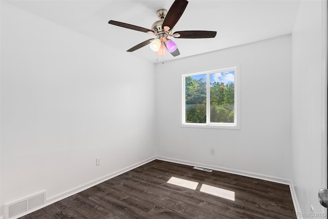 7900 Wiggins Rd, Howell, MI 48855 - unfurnished room with a ceiling fan and dark wood-style floors