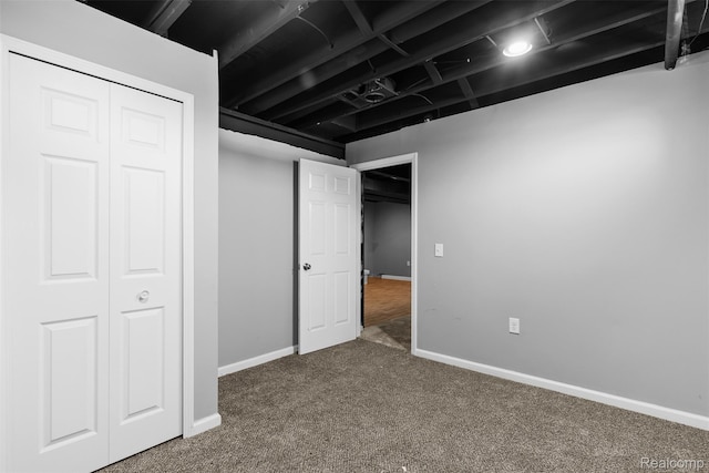 7900 Wiggins Rd, Howell, MI 48855 - unfurnished bedroom featuring carpet flooring and a closet