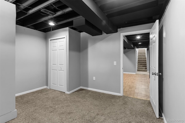 7900 Wiggins Rd, Howell, MI 48855 - finished below grade area with carpet flooring and stairs