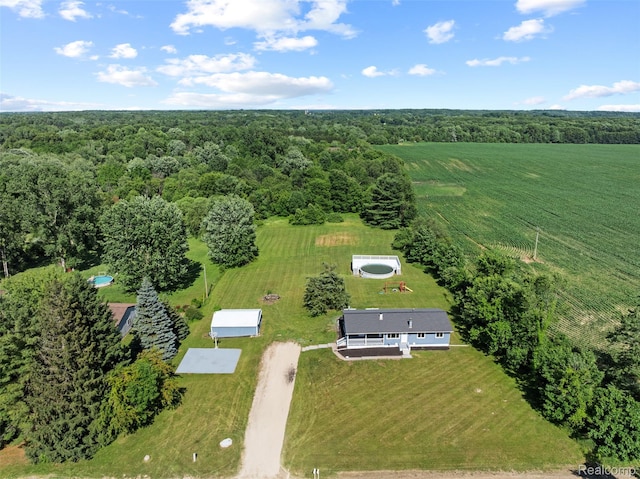 7900 Wiggins Rd, Howell, MI 48855 - overview of rural landscape with a heavily wooded area