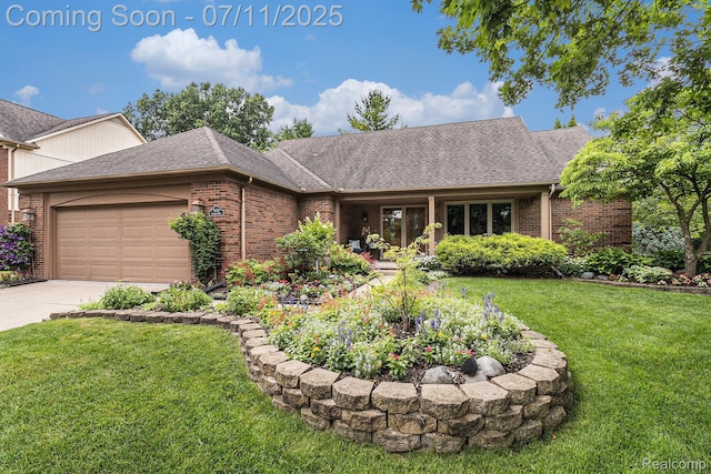 5131 Standish Dr, Troy, MI 48085 - view of front of house featuring brick siding, a garage, a front lawn, and concrete driveway