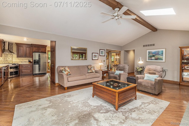 5131 Standish Dr, Troy, MI 48085 - living area with a ceiling fan, dark wood-style floors, and a skylight