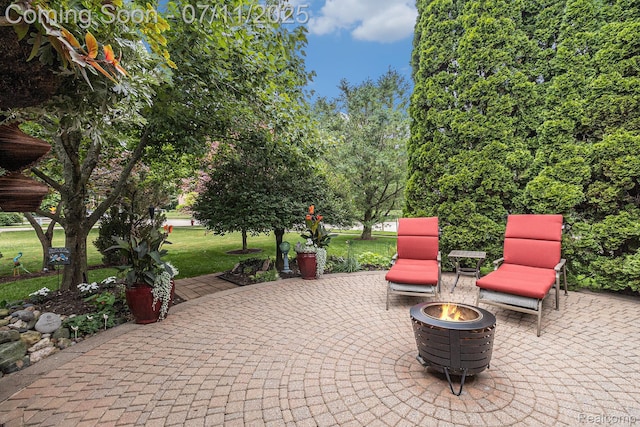 5131 Standish Dr, Troy, MI 48085 - view of patio / terrace with a fire pit