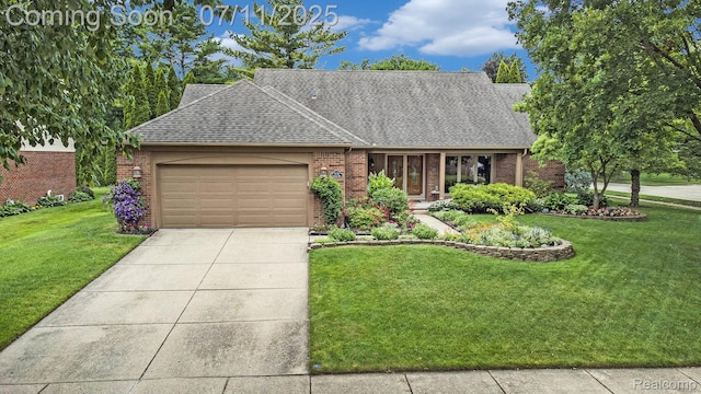 5131 Standish Dr, Troy, MI 48085 - view of front of home featuring brick siding, a garage, a shingled roof, a front lawn, and concrete driveway