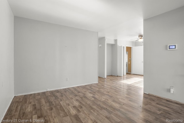18949 Kenosha St, Harper Woods, MI 48225 - empty room with ceiling fan and wood finished floors
