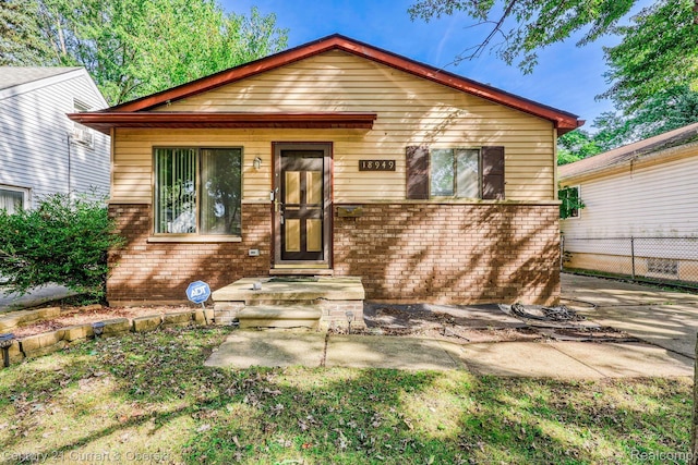 18949 Kenosha St, Harper Woods, MI 48225 - bungalow-style house featuring brick siding