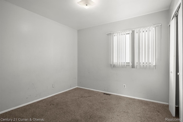 18949 Kenosha St, Harper Woods, MI 48225 - carpeted spare room with baseboards