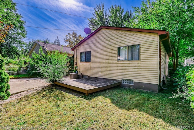 18949 Kenosha St, Harper Woods, MI 48225 - back of property featuring a wooden deck