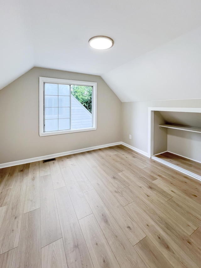 20283 Lancaster St, Harper Woods, MI 48225 - additional living space with wood finished floors and lofted ceiling