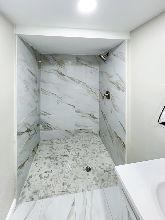 20283 Lancaster St, Harper Woods, MI 48225 - full bathroom featuring a marble finish shower and vanity