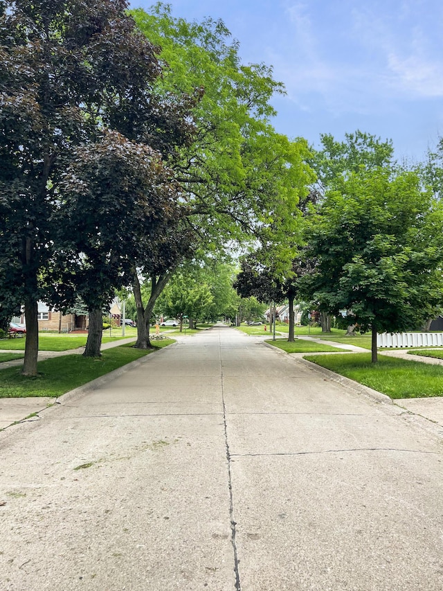 20283 Lancaster St, Harper Woods, MI 48225 - view of concrete street with curbs and sidewalks